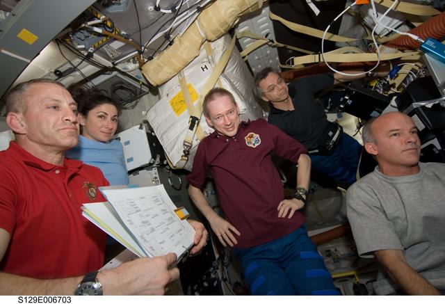 NASA image: View of Expedition 21/STS-129 Crew Members on the Shuttle Atlantis Middeck