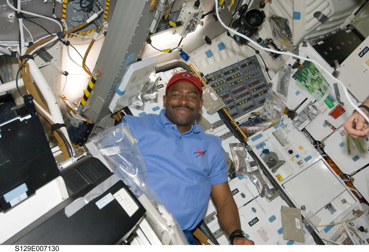 S129-E-007130 (20 Nov. 2009) --- Astronaut Leland Melvin, STS-129 mission specialist, is pictured on the middeck of Space Shuttle Atlantis while docked with the International Space Station.