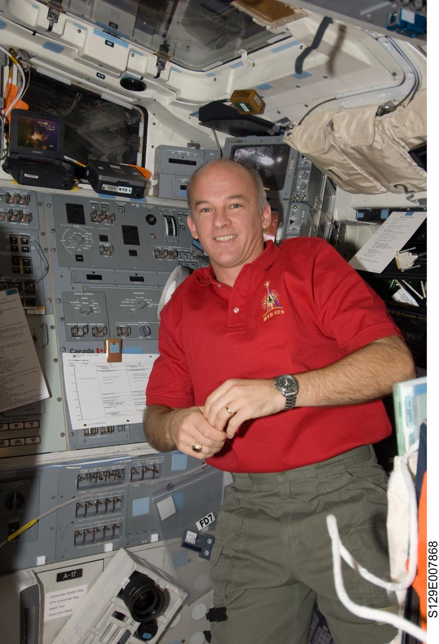 S129-E-007868 (23 Nov. 2009) --- Astronaut Jeffrey Williams, Expedition 21 flight engineer, is pictured on the aft flight deck of space shuttle Atlantis (STS-129) while docked with the International Space Station.