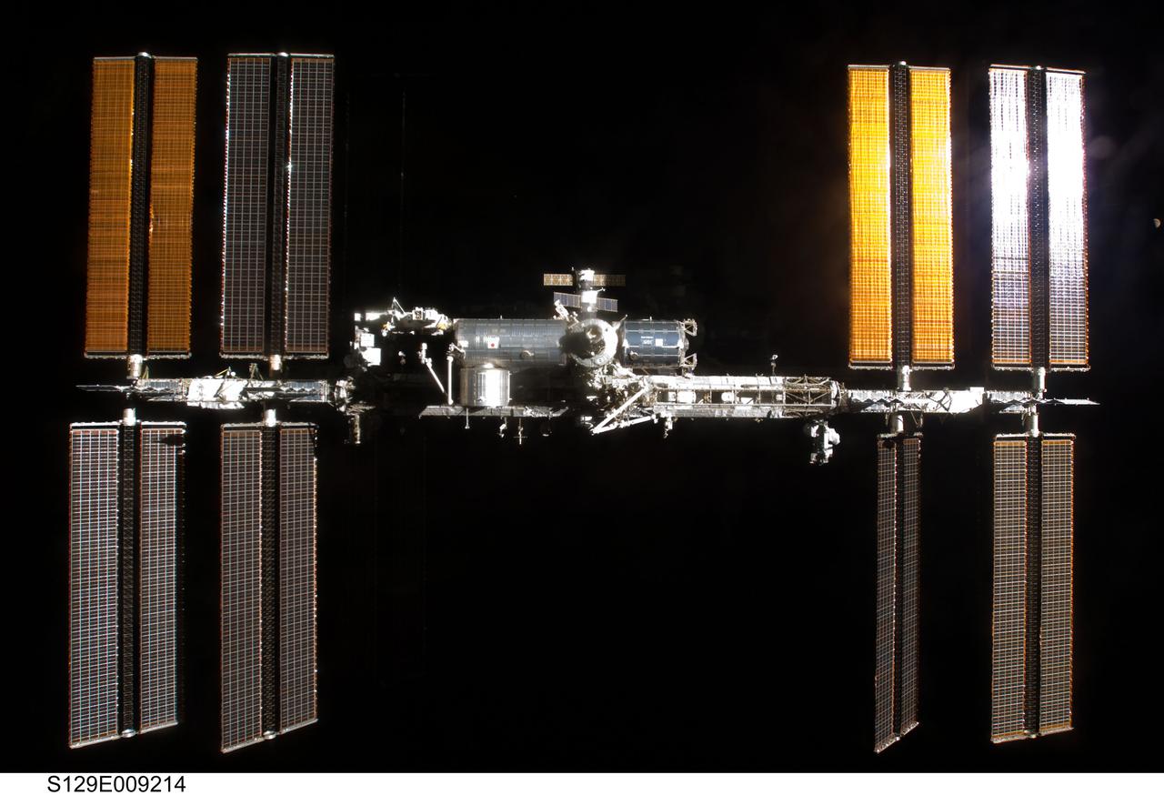S129-E-009214 (25 Nov. 2009) --- Surrounded by the blackness of space, the International Space Station is featured in this image photographed by an STS-129 crew member on Atlantis soon after the station and shuttle began their post-undocking relative separation. Undocking of the two spacecraft occurred at 3:53 a.m. (CST) on Nov. 25, 2009.