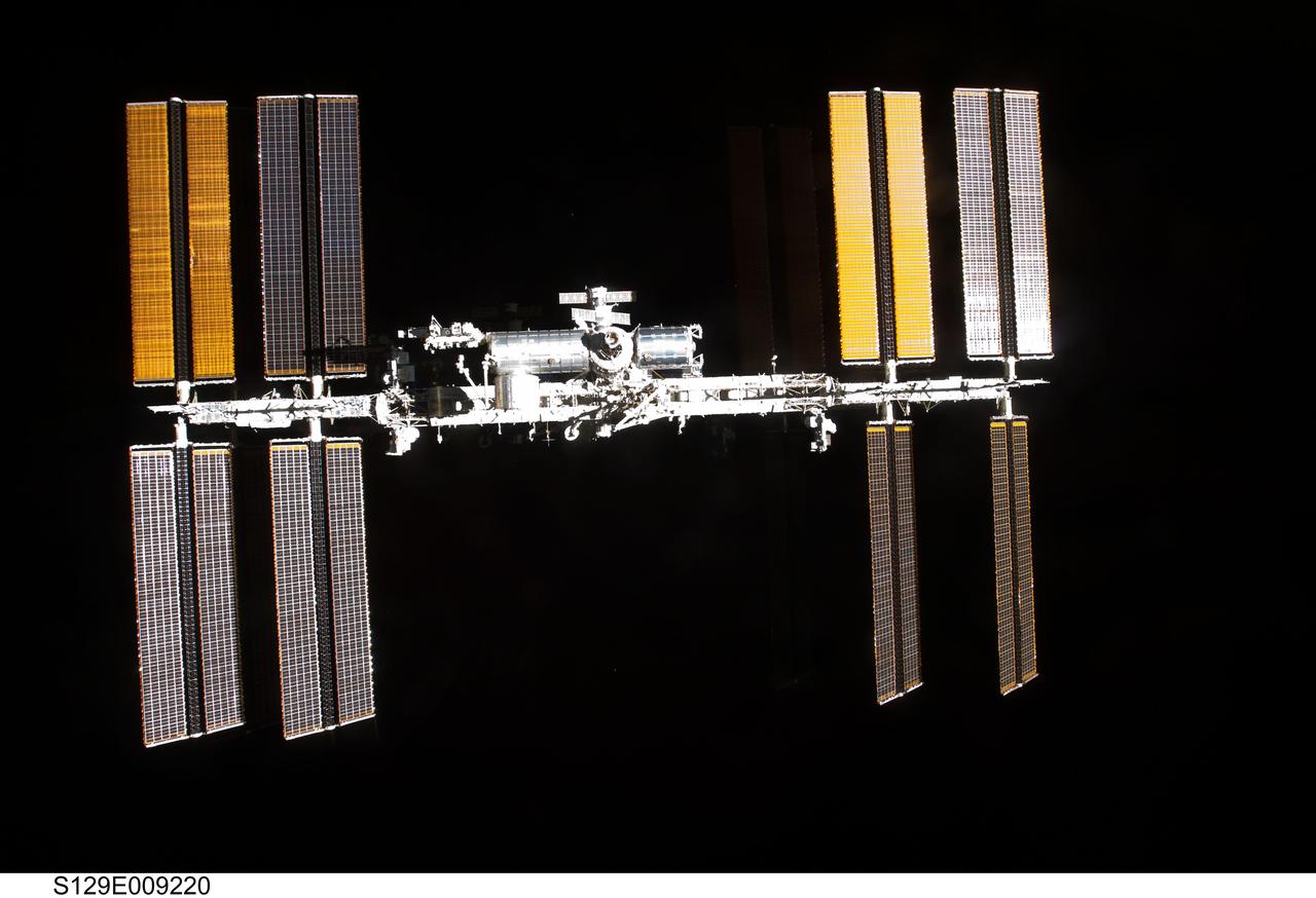 S129-E-009220 (25 Nov. 2009) --- Surrounded by the blackness of space, the International Space Station is featured in this image photographed by an STS-129 crew member on Atlantis soon after the station and shuttle began their post-undocking relative separation. Undocking of the two spacecraft occurred at 3:53 a.m. (CST) on Nov. 25, 2009.
