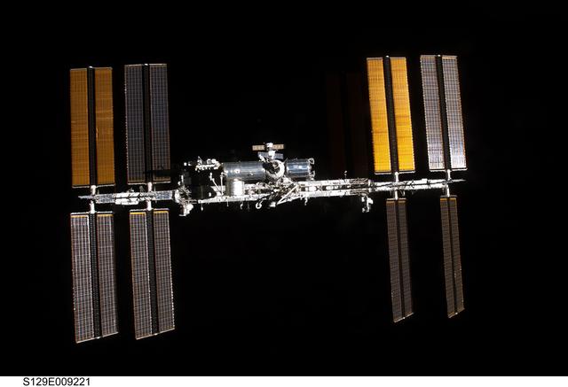 NASA image: Overall view of the ISS taken as Atlantis departs at the end of the STS-129 Mission