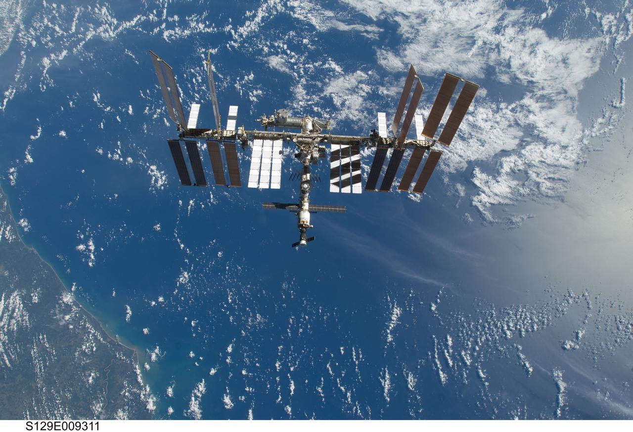 S129-E-009311 (25 Nov. 2009) --- This is one of a series of images featuring the International Space Station photographed soon after the space shuttle Atlantis and the station began their post-undocking relative separation.  Undocking of the two spacecraft occurred at 3:53 a.m. (CST) on Nov. 25, 2009. Some scenes in the series show parts of the Mediterranean Sea and Africa and Spain in the background.