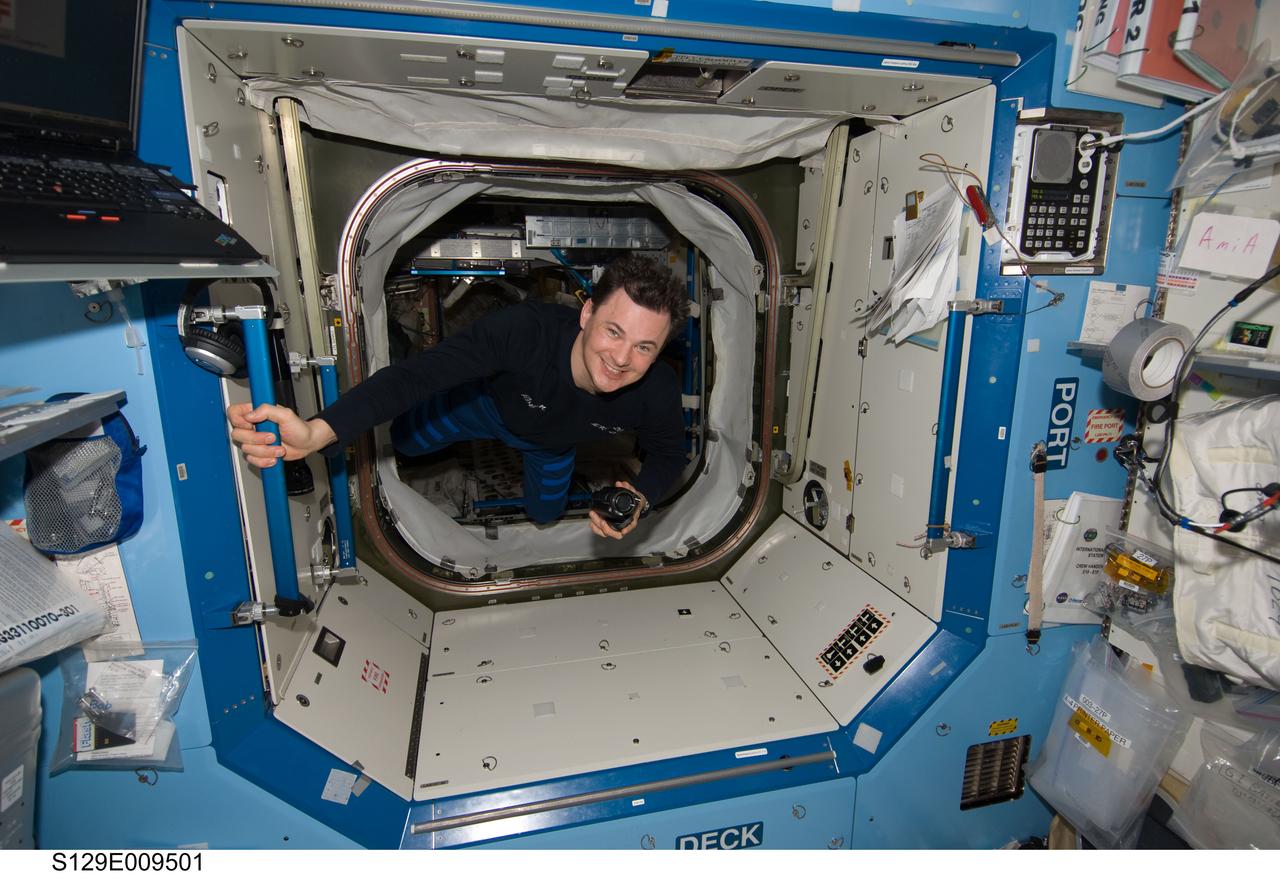 S129-E-009501 (24 Nov. 2009) --- Cosmonaut Roman Romanenko, Expedition 20/21 flight engineer, is pictured onboard the International Space Station on the eve of the undocking of the orbital outpost and the space shuttle Atlantis and the departure of the STS-129 crew. Romanenko's tenure onboard the station is winding down, also, as he is scheduled to return to Earth in less than a week onboard a Soyuz spacecraft, along with two crewmates.