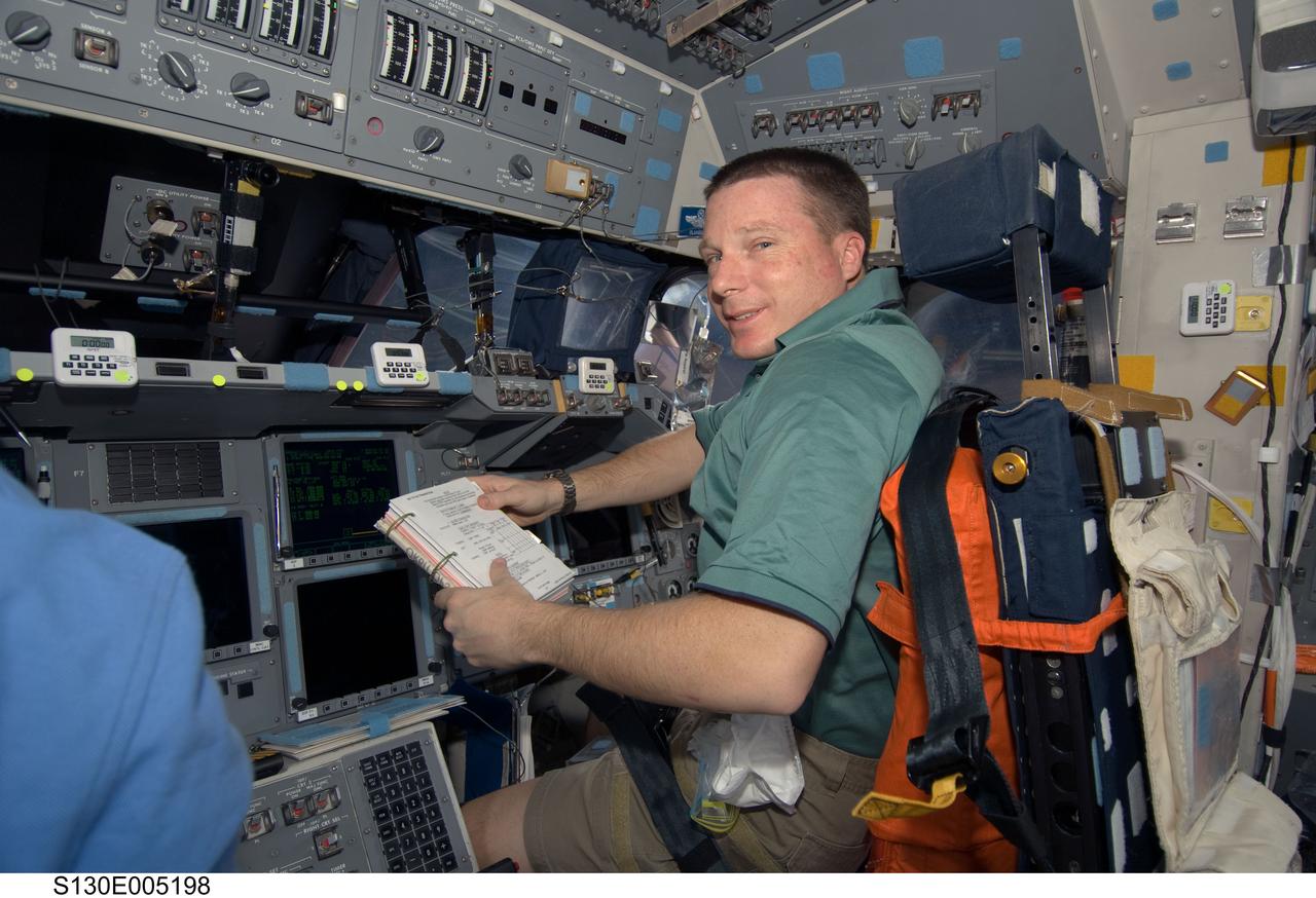 S130-E-005198 (8 Feb. 2010) --- NASA astronaut Terry Virts, STS-130 pilot, occupies the pilot’s station on the flight deck of space shuttle Endeavour during flight day one activities.