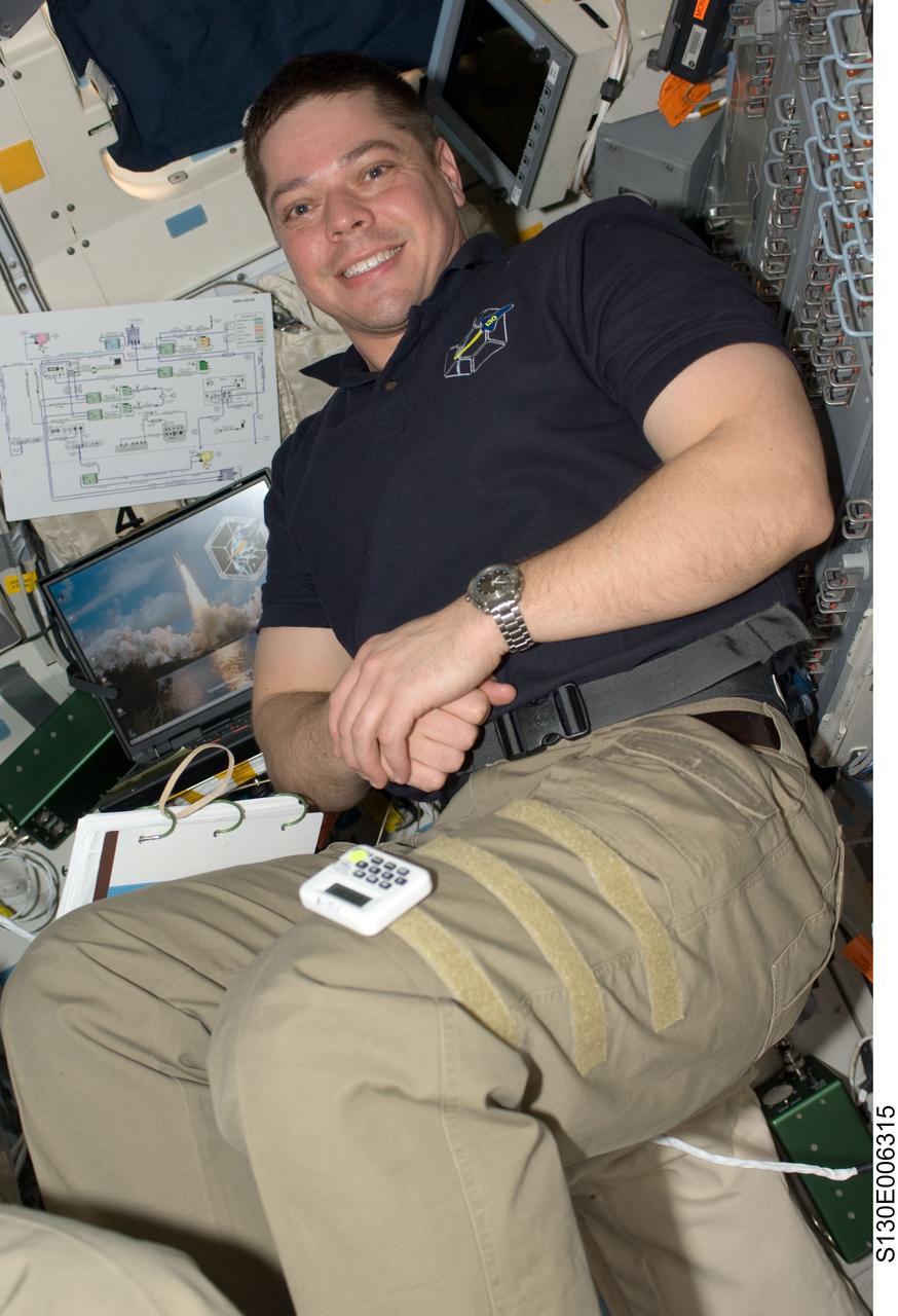 S130-E-006315 (9 Feb. 2010) --- NASA astronaut Robert Behnken, STS-130 mission specialist, is pictured on the aft flight deck of space shuttle Endeavour during flight day two activities.