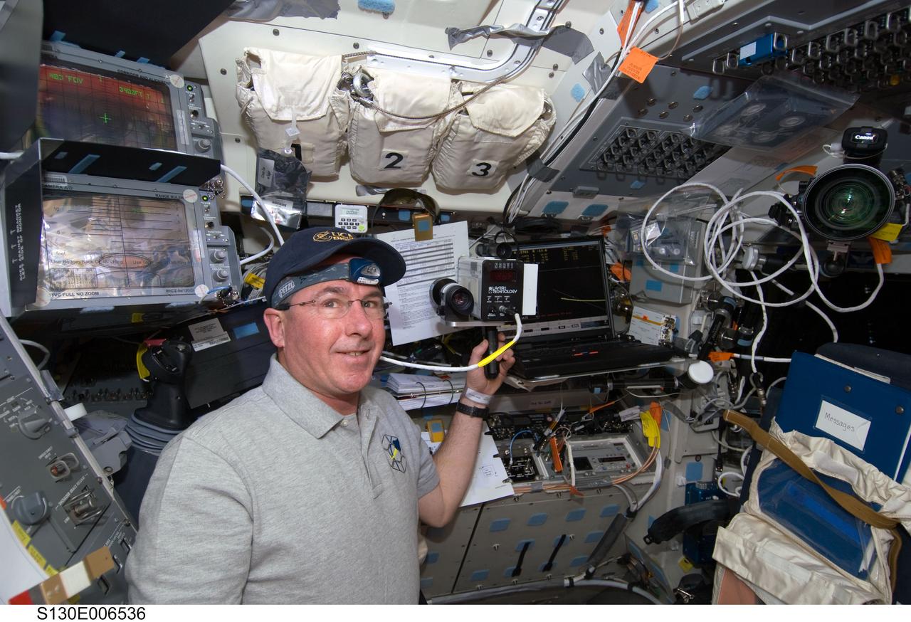 S130-E-006536 (9 Feb. 2010) --- NASA astronaut Stephen Robinson, STS-130 mission specialist, is pictured on the aft flight deck of space shuttle Endeavour during flight day two activities.