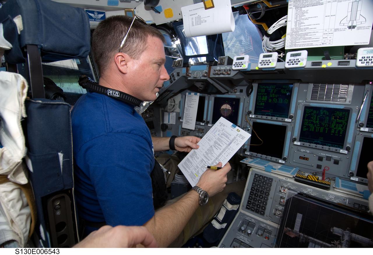 S130-E-006543 (9 Feb. 2010) --- NASA astronaut Terry Virts, STS-130 pilot, occupies the commander’s station on the flight deck of space shuttle Endeavour during flight day two activities.