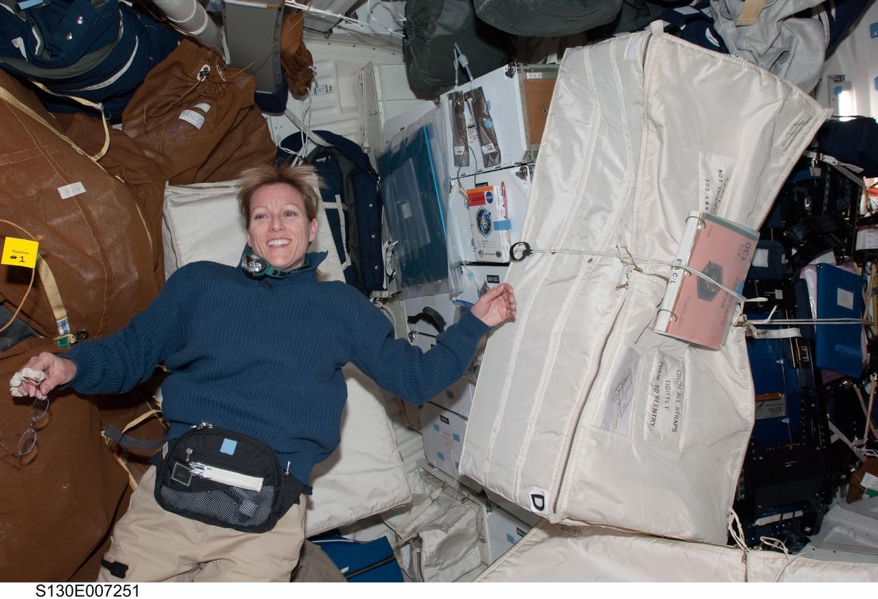 S130-E-007251 (11 Feb. 2010) --- NASA astronaut Kathryn Hire, STS-130 mission specialist, is pictured on the middeck of space shuttle Endeavour while docked with the International Space Station.