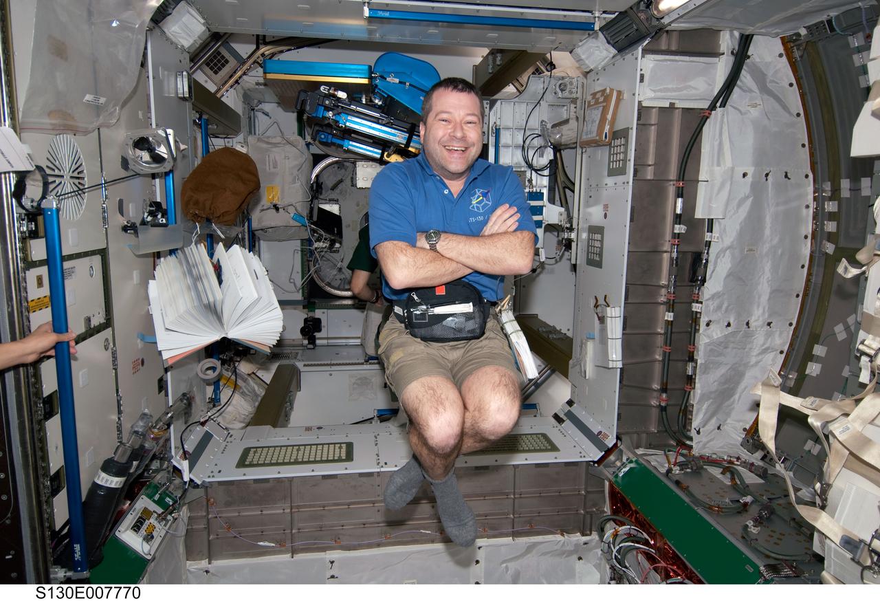S130-E-007770 (14 Feb. 2010) --- NASA astronaut Nicholas Patrick, STS-130 mission specialist, smiles for a photo while floating freely in the newly-installed Tranquility node of the International Space Station while space shuttle Endeavour remains docked with the station.