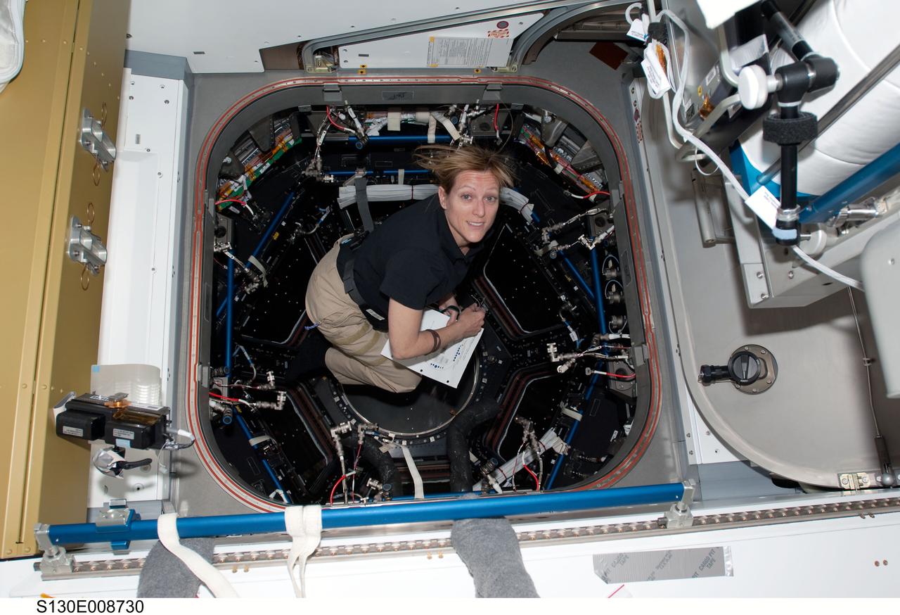 S130-E-008730 (15 Feb. 2010) --- NASA astronaut Kathryn Hire, STS-130 mission specialist, works in the newly-installed Cupola of the International Space Station while space shuttle Endeavour remains docked with the station.