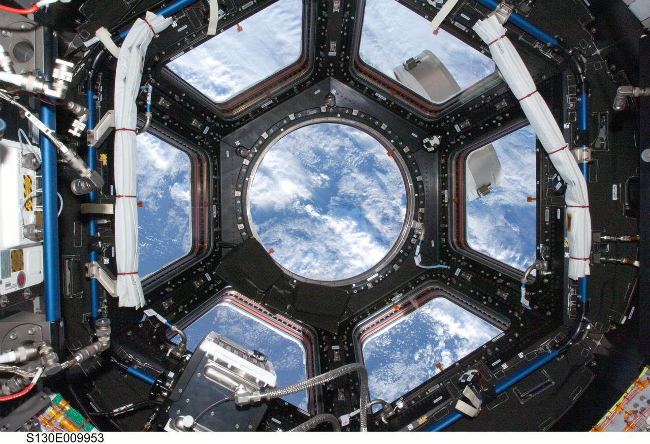 S130-E-009953 (18 Feb. 2010) --- One of the STS-130 crew members visiting the International Space Station recorded this image over the North Atlantic Ocean through the space station's new Cupola on Feb. 18, 2010. Center coordinates of the area pictured are located at approximately 35.95 degrees north latitude and 52.30 degrees west longitude.