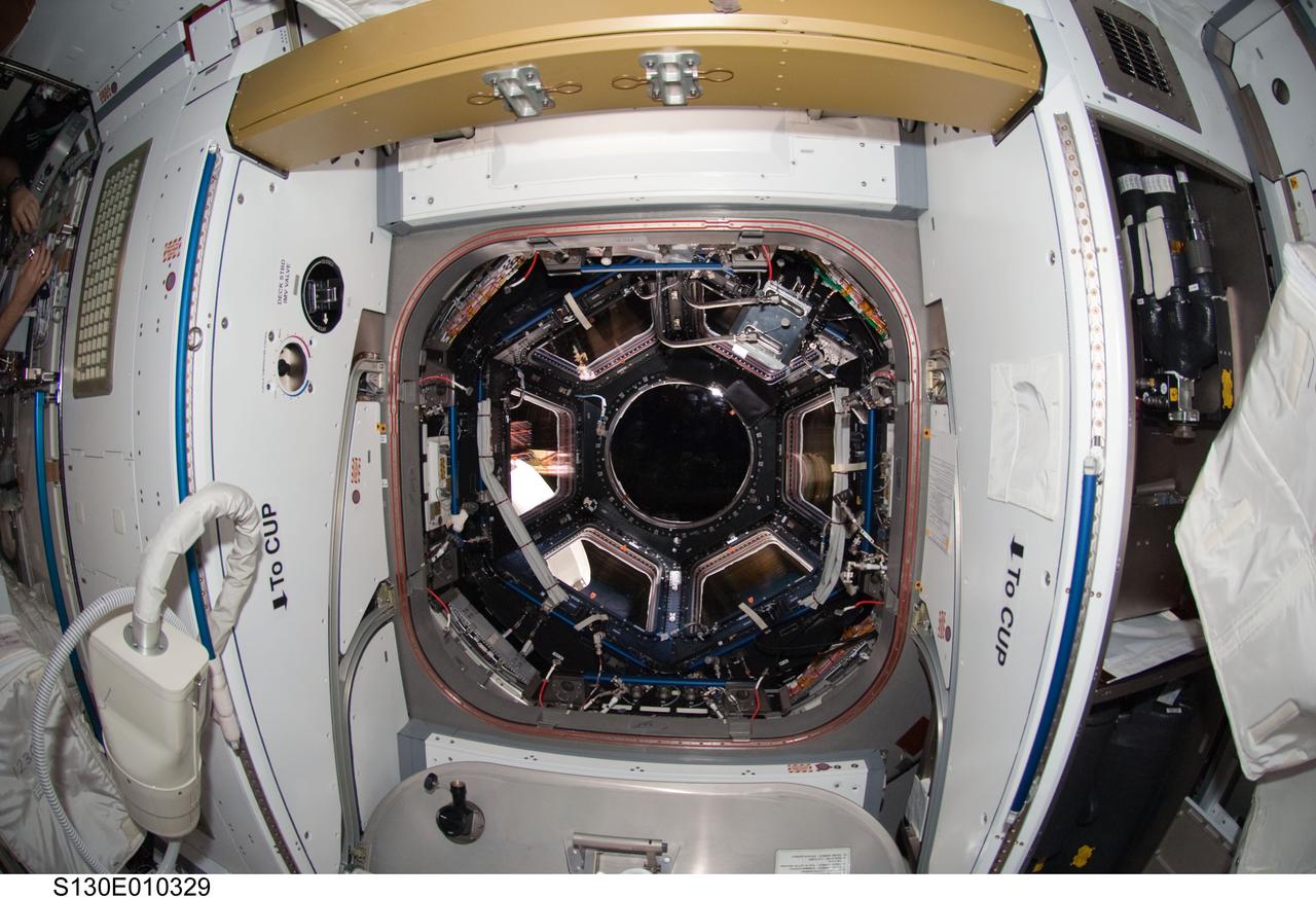 S130-E-010329 (18 Feb. 2010) --- Tranquility node?s Cupola of the International Space Station is featured in this image photographed by an STS-130 crew member while space shuttle Endeavour remains docked with the station.