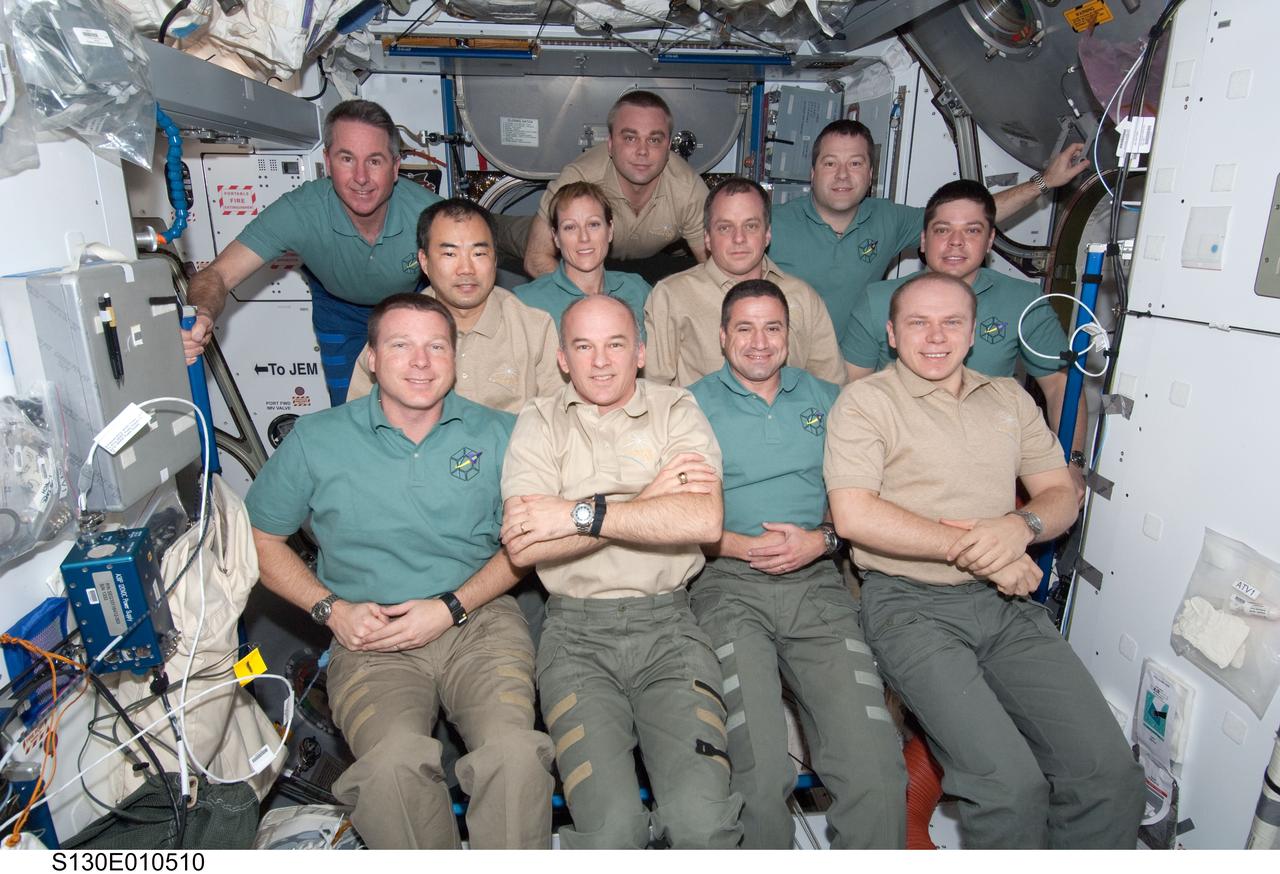 S130-E-010510 (18 Feb. 2010) --- The STS-130 and Expedition 22 crew members pose for a group portrait in the Harmony node following a joint crew news conference while space shuttle Endeavour remains docked with the International Space Station. Pictured from the left (front row) are NASA astronauts Terry Virts, STS-130 pilot; Jeffrey Williams, Expedition 22 commander; George Zamka, STS-130 commander; and Russian cosmonaut Oleg Kotov, Expedition 22 flight engineer. Pictured from the left (middle row) are Japan Aerospace Exploration Agency (JAXA) astronaut Soichi Noguchi, Expedition 22 flight engineer; NASA astronauts Kathryn Hire, STS-130 mission specialist; T.J. Creamer, Expedition 22 flight engineer; and Robert Behnken, STS-130 mission specialist. Pictured on the back row are NASA astronauts Stephen Robinson (left) and Nicholas Patrick (right), both STS-130 mission specialists; along with Russian cosmonaut Maxim Suraev, Expedition 22 flight engineer.