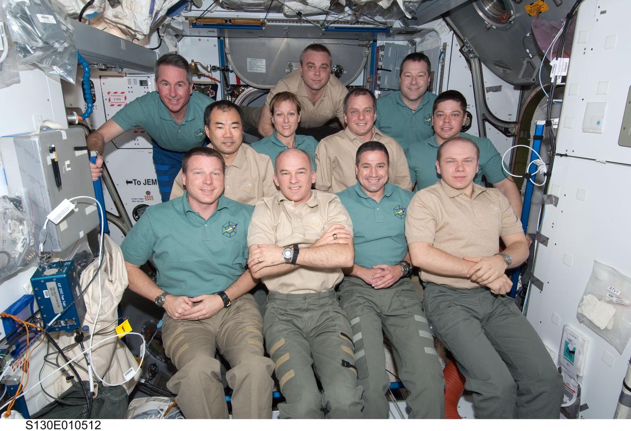 S130-E-010512 (18 Feb. 2010) --- The STS-130 and Expedition 22 crew members pose for a group portrait in the Harmony node following a joint crew news conference while space shuttle Endeavour remains docked with the International Space Station. Pictured from the left (front row) are NASA astronauts Terry Virts, STS-130 pilot; Jeffrey Williams, Expedition 22 commander; George Zamka, STS-130 commander; and Russian cosmonaut Oleg Kotov, Expedition 22 flight engineer. Pictured from the left (middle row) are Japan Aerospace Exploration Agency (JAXA) astronaut Soichi Noguchi, Expedition 22 flight engineer; NASA astronauts Kathryn Hire, STS-130 mission specialist; T.J. Creamer, Expedition 22 flight engineer; and Robert Behnken, STS-130 mission specialist. Pictured on the back row are NASA astronauts Stephen Robinson (left) and Nicholas Patrick (right), both STS-130 mission specialists; along with Russian cosmonaut Maxim Suraev, Expedition 22 flight engineer.