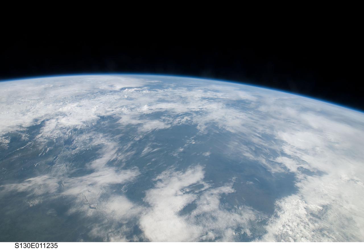 S130-E-011235 (20 Feb. 2010) --- After several days of seeing out-the-window close-up views of the various elements of the International Space Station, the STS-130 crewmembers aboard the space shuttle Endeavour got a fresh look at the home planet after separating from the orbital outpost. Eleven astronauts and cosmonauts worked together to continue construction on the orbital outpost and perform other tasks in tandem.