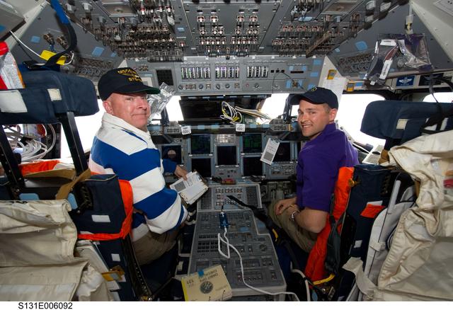NASA image: Poindexter and Dutton on Discovery flight deck