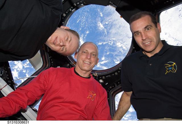 NASA image: Astronauts pose in Cupola