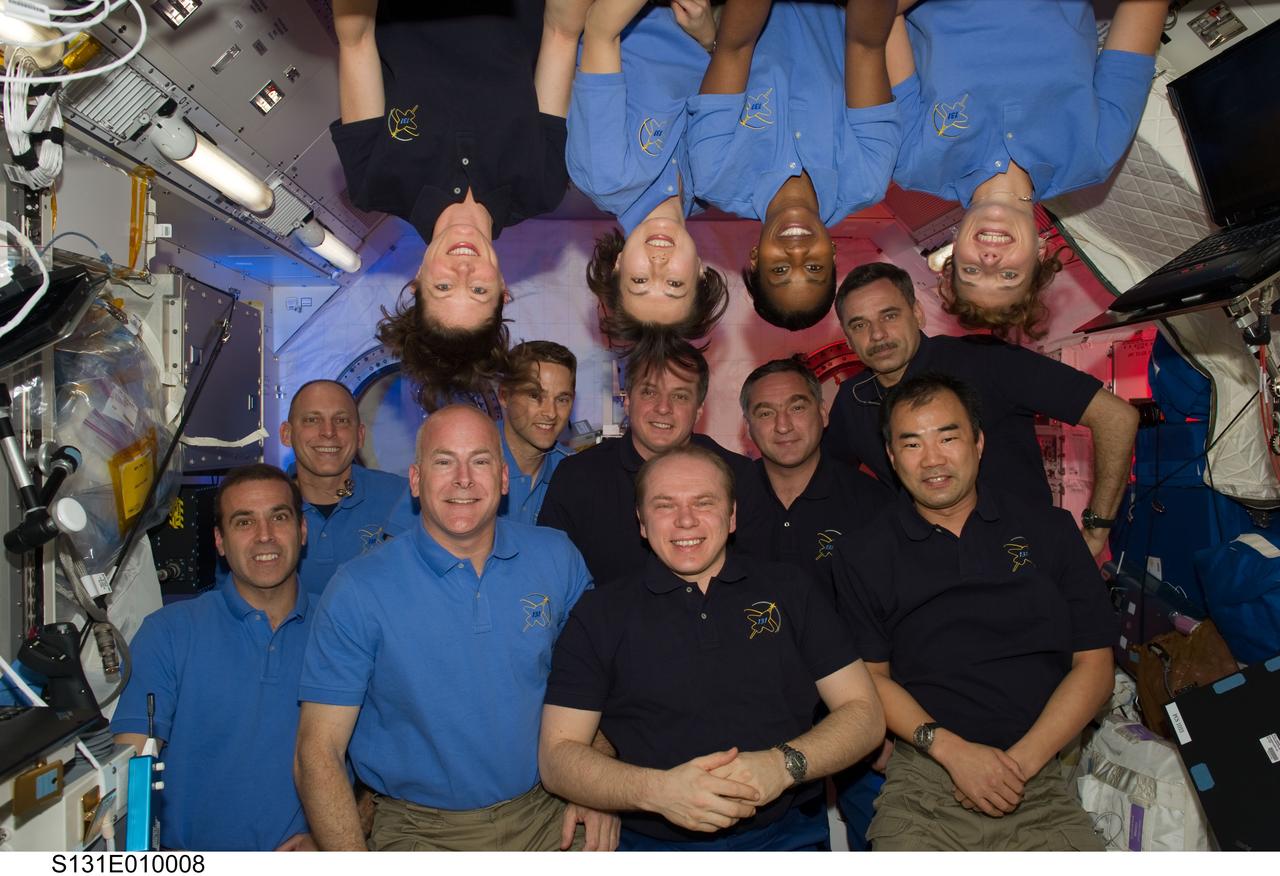 S131-E-010008 (14 April 2010) --- STS-131 and Expedition 23 crew members gather for a group portrait in the Kibo laboratory of the International Space Station while space shuttle Discovery remains docked with the station. STS-131 crew members pictured (light blue shirts) are NASA astronauts Alan Poindexter, commander; James P. Dutton Jr., pilot; Clayton Anderson, Rick Mastracchio, Dorothy Metcalf-Lindenburger, Stephanie Wilson and Japan Aerospace Exploration Agency astronaut Naoko Yamazaki, all mission specialists. Expedition 23 crew members pictured are Russian cosmonauts Oleg Kotov, commander; Mikhail Kornienko and Alexander Skvortsov; Japan Aerospace Exploration Agency astronaut Soichi Noguchi, and NASA astronauts T.J. Creamer and Tracy Caldwell Dyson, all flight engineers.