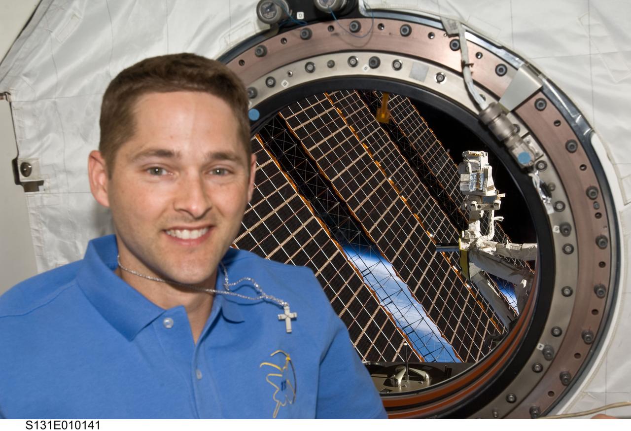 S131-E-010141 (14 April 2010) --- NASA astronaut James P. Dutton Jr., STS-131 pilot, poses for a photo near a window in the Kibo laboratory of the International Space Station while space shuttle Discovery remains docked with the station.