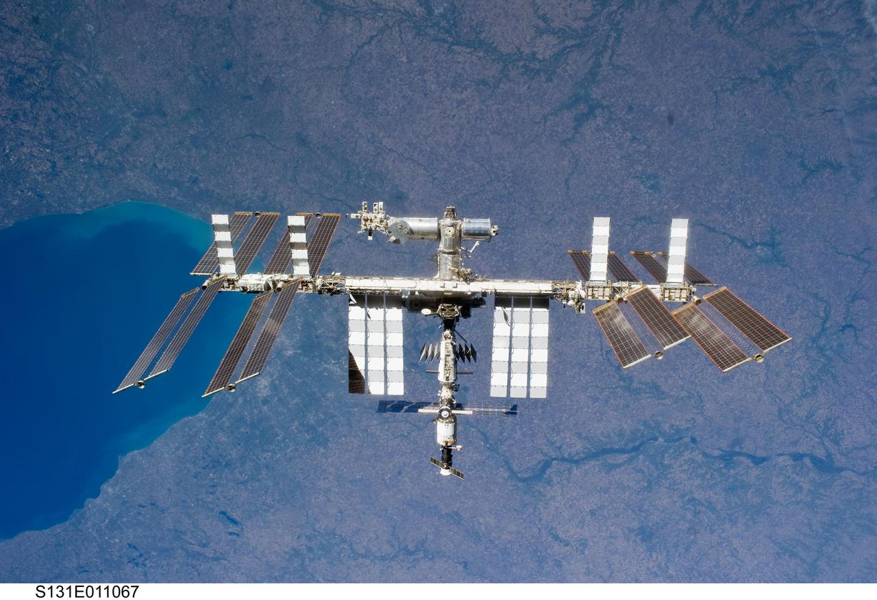 S131-E-011067 (17 April 2010) --- The International Space Station is featured in this image photographed by an STS-131 crew member on space shuttle Discovery after the station and shuttle began their post-undocking relative separation. Undocking of the two spacecraft occurred at 7:52 a.m. (CDT) on April 17, 2010.