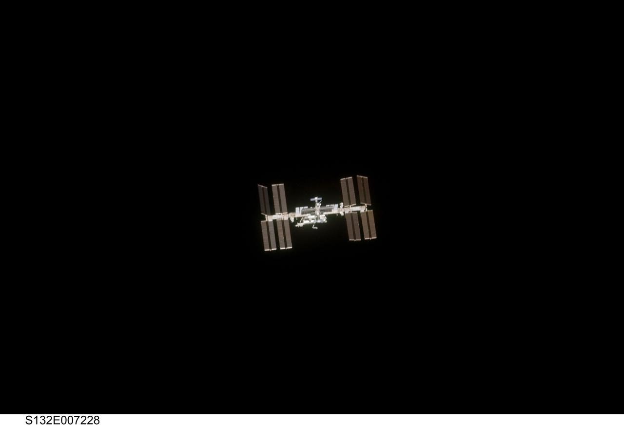 S132-E-007228 (16 May 2010) --- Surrounded by the blackness of space, the International Space Station appears to be very small from the point of view of space shuttle Atlantis as the shuttle approaches the station during STS-132 rendezvous and docking operations. Docking occurred at 9:28 a.m. (CDT) on May 16, 2010.