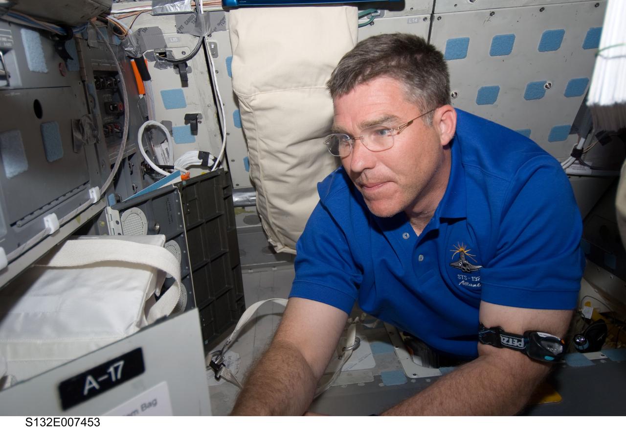 S132-E-007453 (15 May 2010) --- NASA astronaut Steve Bowen, STS-132 mission specialist, works on the middeck of the Earth-orbiting space shuttle Atlantis during flight day two activities.