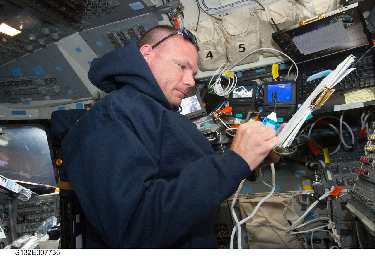 S132-E-007736 (17 May 2010) --- NASA astronaut Tony Antonelli, STS-132 pilot, works on the aft flight deck of the space shuttle Atlantis while docked with the International Space Station.