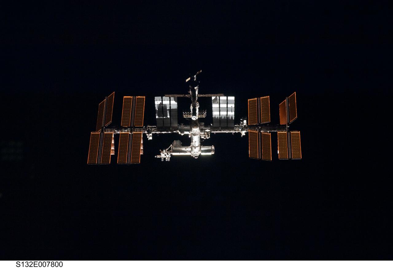 S132-E-007800 (16 May 2010) --- The International Space Station is featured in this image photographed by an STS-132 crew member on space shuttle Atlantis as the shuttle approaches the station during rendezvous and docking operations. Docking occurred at 9:28 a.m. (CDT) on May 16, 2010.