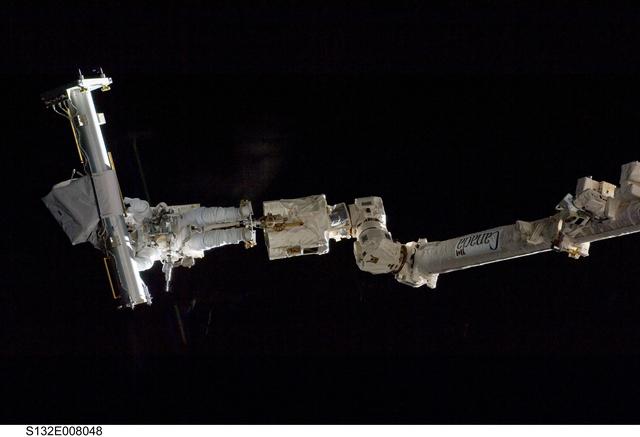 NASA image: Reisman attached to an APFR on EVA 1 during Joint Operations