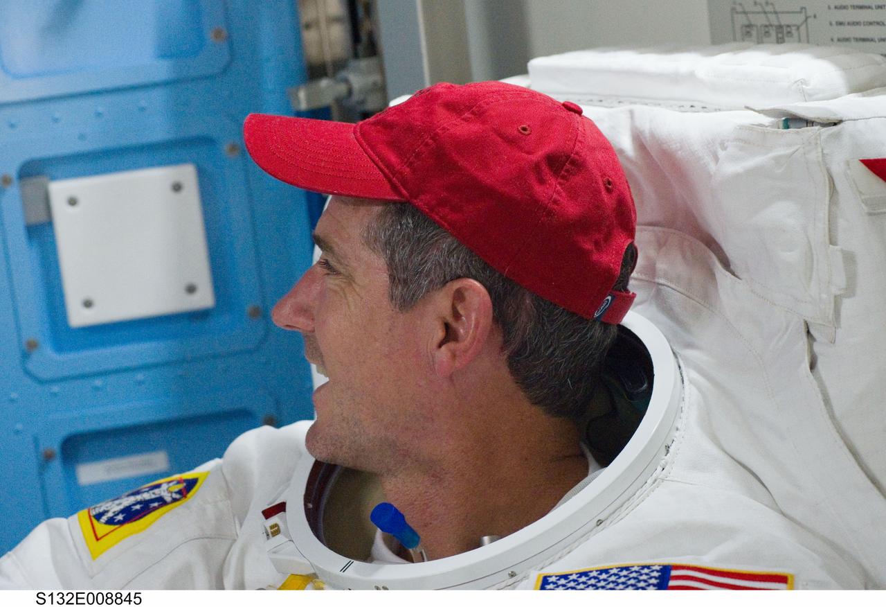 S132-E-008845 (19 May 2010) --- NASA astronaut Michael Good, STS-132 mission specialist, is pictured in the Quest airlock of the International Space Station as the mission’s second spacewalk draws to a close.