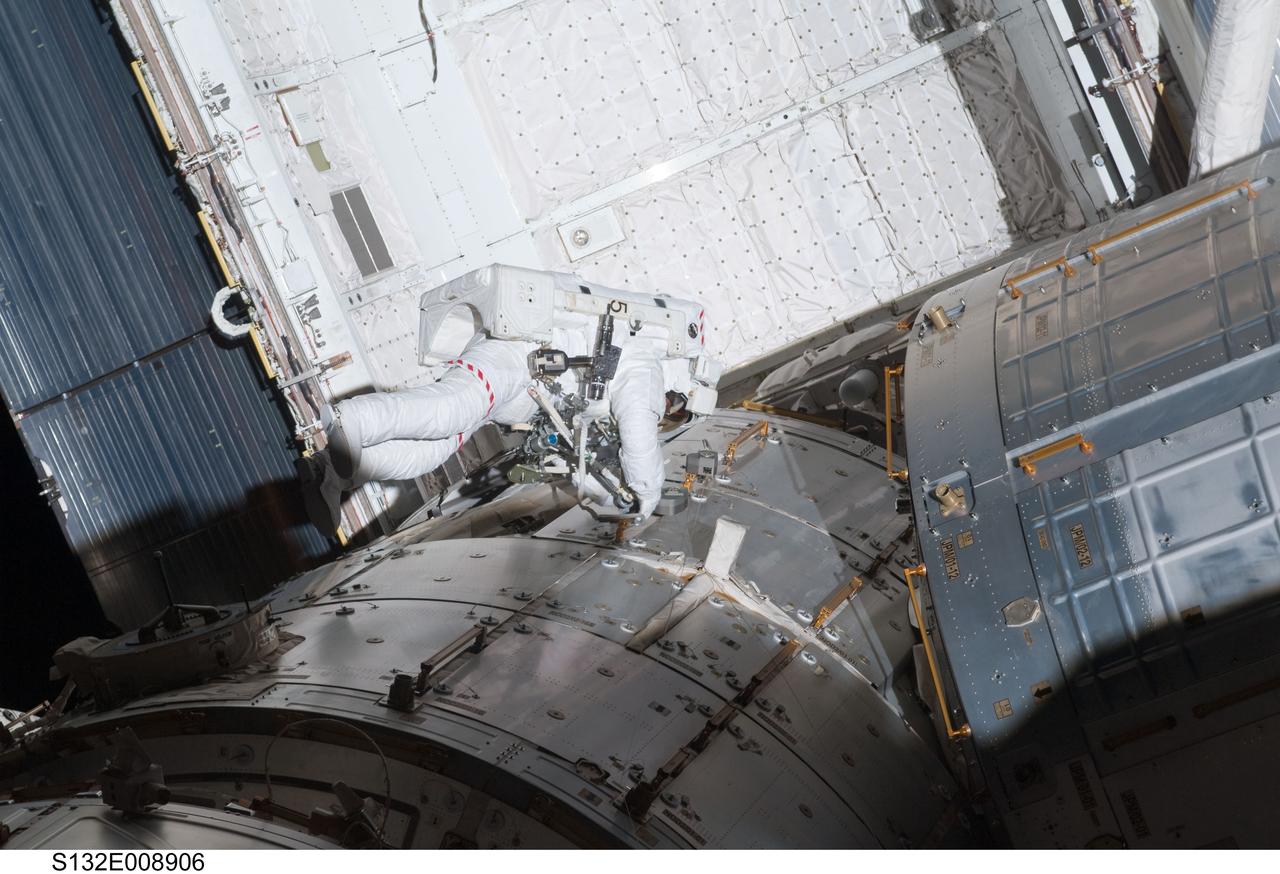 S132-E-008906 (21 May 2010) --- NASA astronaut Michael Good, STS-132 mission specialist, participates in the mission’s third and final session of extravehicular activity (EVA) as construction and maintenance continue on the International Space Station. During the six-hour, 46-minute spacewalk, Good and NASA astronaut Garrett Reisman (out of frame), mission specialist, completed the installation of the final two of the six new batteries for the B side of the port 6 solar array. In addition, the astronauts installed a backup ammonia jumper cable between the port 4 and 5 trusses of the station, transferred a Power and Data Grapple Fixture from the shuttle to the station, and reconfigured some tools.