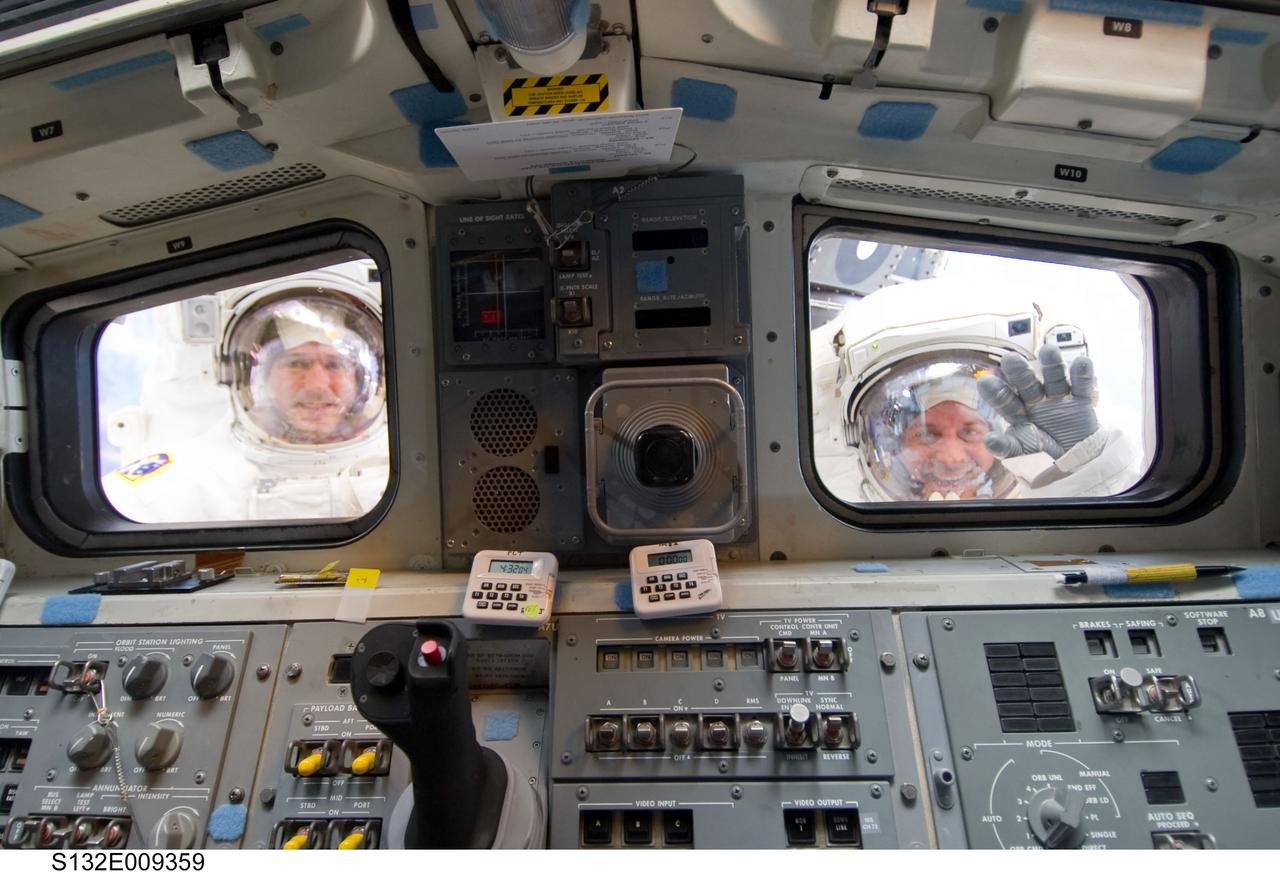 Good and Reisman outside the aft FD windows during STS-132 EVA-3