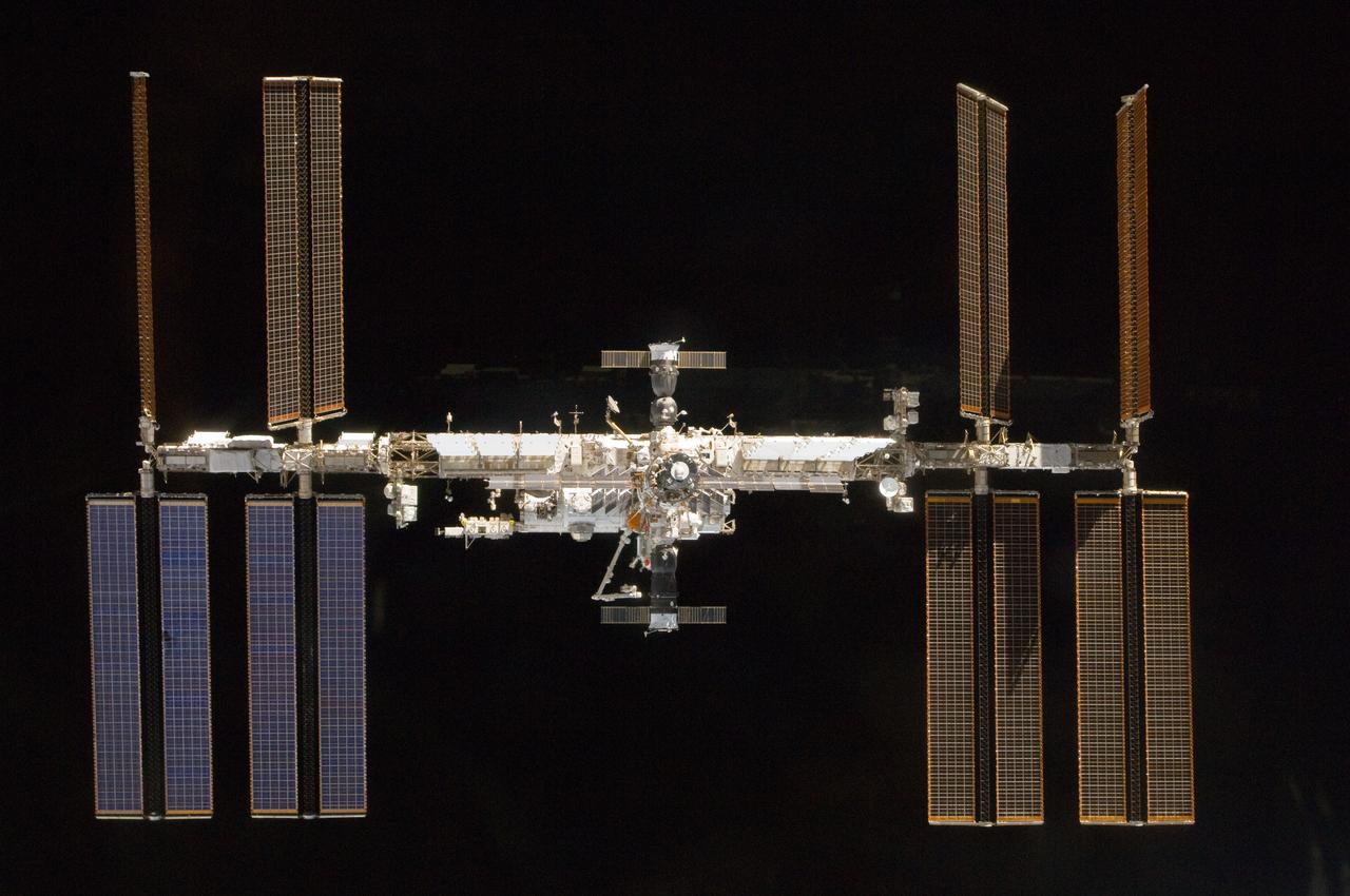 S132-E-012260 (23 May 2010) --- The International Space Station is featured in this image photographed by an STS-132 crew member on space shuttle Atlantis after the station and shuttle began their post-undocking relative separation. Undocking of the two spacecraft occurred at 10:22 a.m. (CDT) on May 23, 2010, ending a seven-day stay that saw the addition of a new station module, replacement of batteries and resupply of the orbiting outpost.
