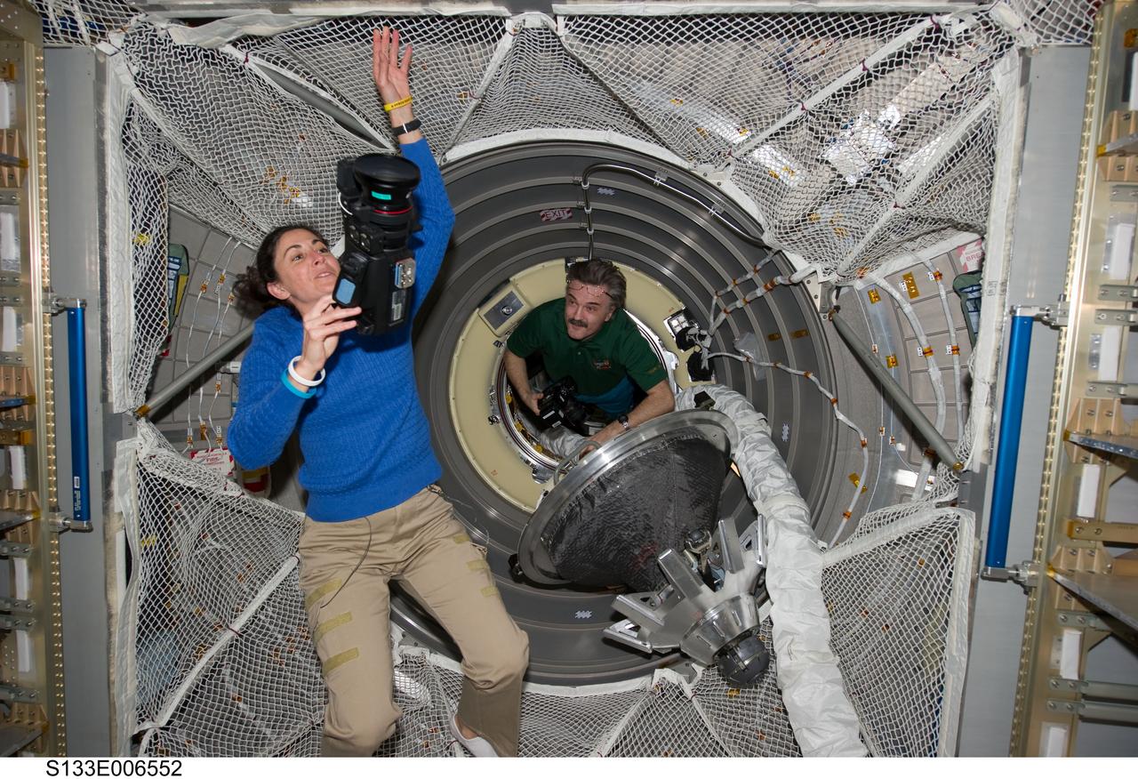 S133-E-006552 (26 Feb. 2011) --- NASA astronaut Nicole Stott, STS-133 mission specialist; and Russian cosmonaut Alexander Kaleri, Expedition 26 flight engineer, are pictured in the European Space Agency's "Johannes Kepler" Automated Transfer Vehicle-2 (ATV-2) currently docked to the International Space Station. Photo credit: NASA or National Aeronautics and Space Administration
