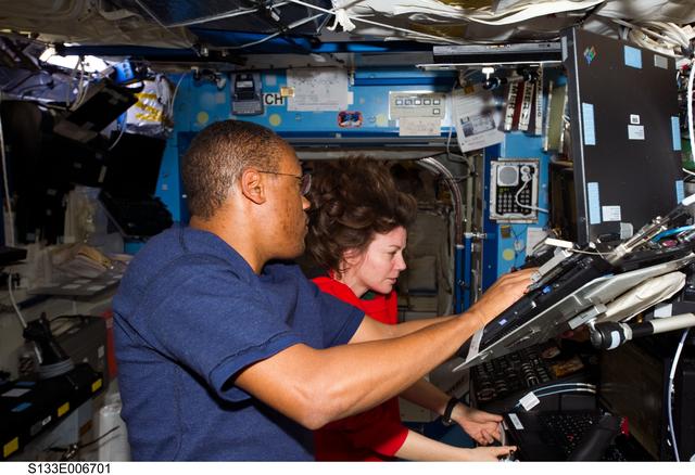 NASA image: Drew and Coleman at SSRMS workstation