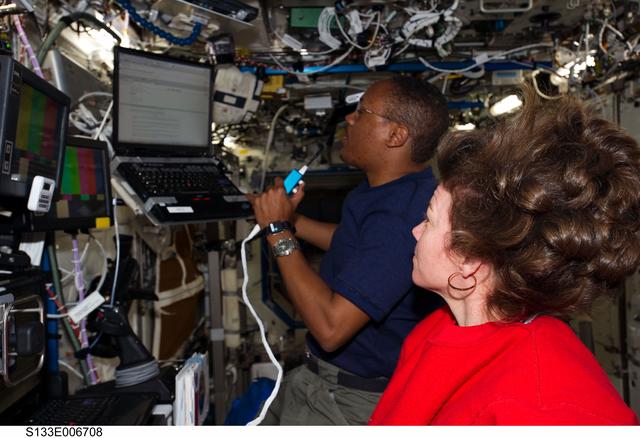 NASA image: Drew and Coleman at SSRMS workstation