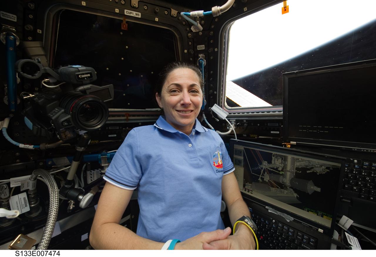 S133-E-007474 (1 March 2011) --- NASA astronaut Nicole Stott, STS-133 mission specialist, is pictured in the Cupola of the International Space Station while space shuttle Discovery remains docked with the station. Photo credit: NASA or National Aeronautics and Space Administration