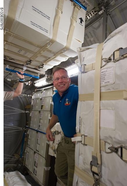 NASA image: STS-133 and Expedition 26 crew enter PMM (Permanent Multipurpose Module)