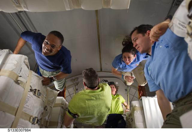 NASA image: STS-133 and Expedition 26 crew enter PMM (Permanent Multipurpose Module)
