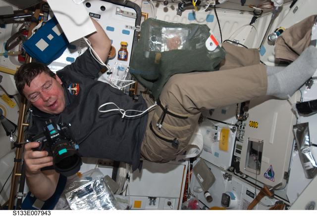 NASA image: Barratt on Middeck with camera