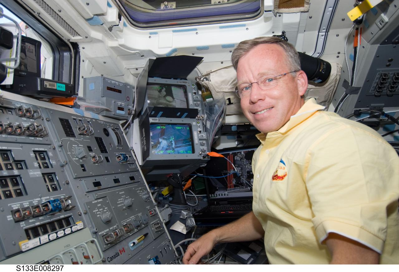 S133-E-008297 (2 March 2011) --- NASA astronaut Steve Lindsey, STS-133 commander, is pictured on the aft flight deck of space shuttle Discovery while docked with the International Space Station. Photo credit: NASA or National Aeronautics and Space Administration