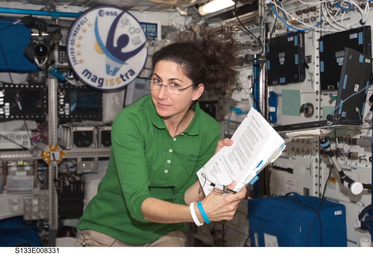 S133-E-008331 (3 March 2011) --- NASA astronaut Nicole Stott, STS-133 mission specialist, is pictured in the Columbus laboratory of the International Space Station while space shuttle Discovery remains docked with the station. Photo credit: NASA or National Aeronautics and Space Administration