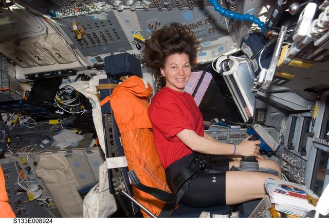NASA image: Coleman on Discovery forward flight deck
