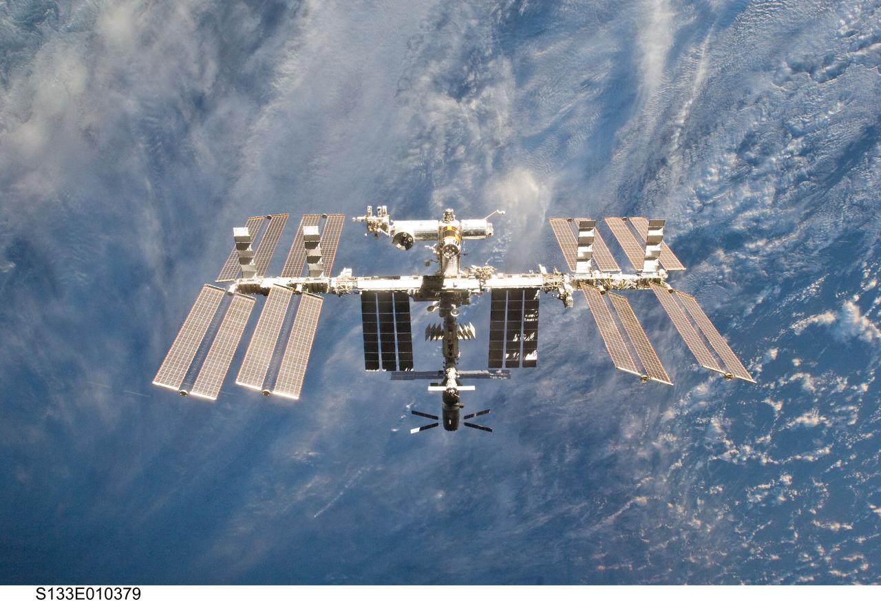 S133-E-010379 (7 March 2011) --- The International Space Station is featured in this image photographed by an STS-133 crew member on space shuttle Discovery after the station and shuttle began their post-undocking relative separation. Undocking of the two spacecraft occurred at 7 a.m. (EST) on March 7, 2011. Discovery spent eight days, 16 hours, and 46 minutes attached to the orbiting laboratory. Photo credit: NASA or National Aeronautics and Space Administration