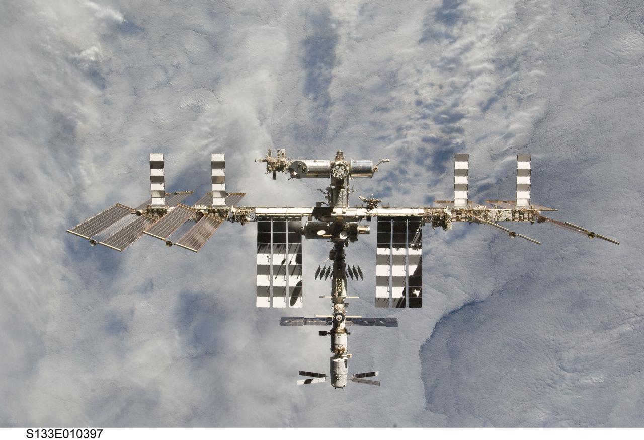 S133-E-010397 (7 March 2011) --- The International Space Station is featured in this image photographed by an STS-133 crew member on space shuttle Discovery after the station and shuttle began their post-undocking relative separation. Undocking of the two spacecraft occurred at 7 a.m. (EST) on March 7, 2011. Discovery spent eight days, 16 hours, and 46 minutes attached to the orbiting laboratory. Photo credit: NASA or National Aeronautics and Space Administration