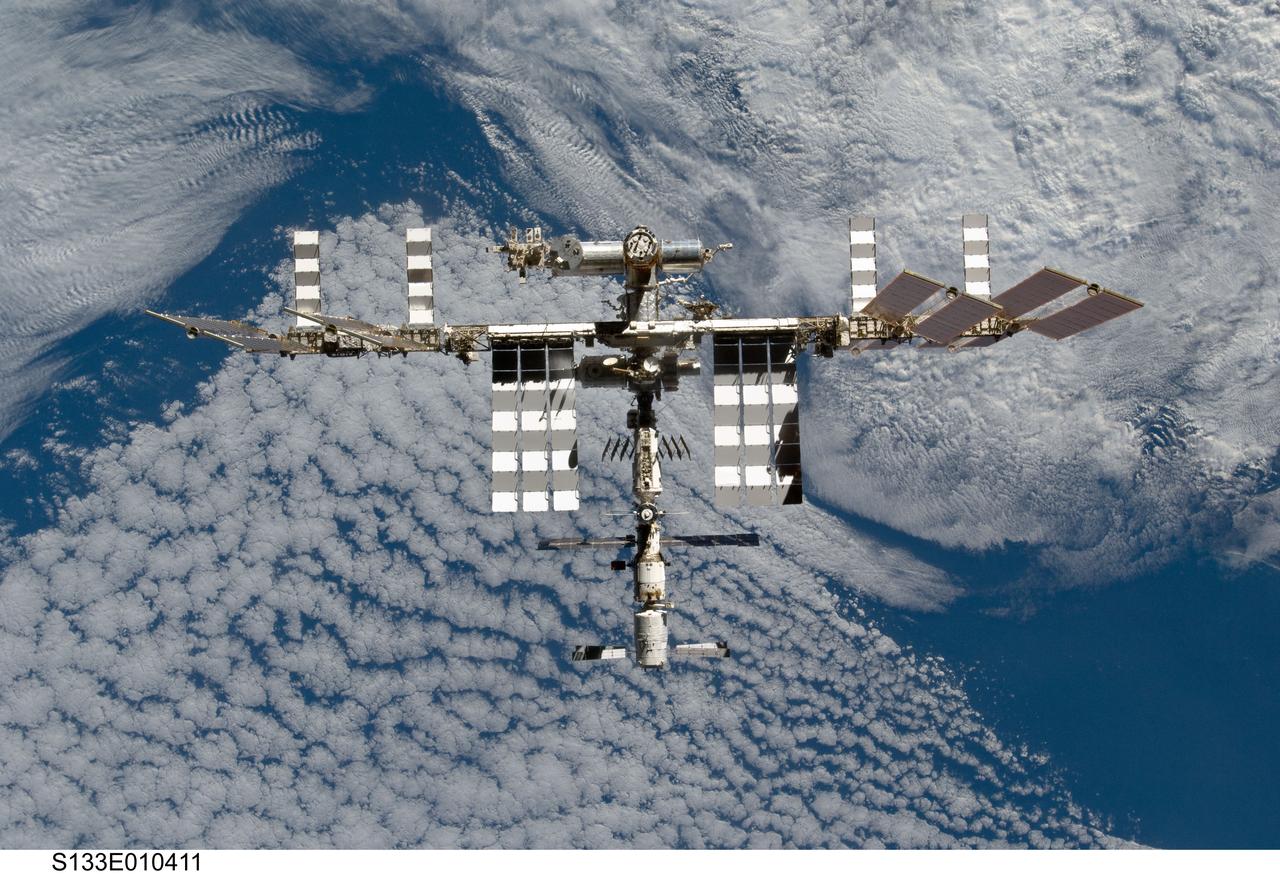 S133-E-010411 (7 March 2011) --- The International Space Station is featured in this image photographed by an STS-133 crew member on space shuttle Discovery after the station and shuttle began their post-undocking relative separation. Undocking of the two spacecraft occurred at 7 a.m. (EST) on March 7, 2011. Discovery spent eight days, 16 hours, and 46 minutes attached to the orbiting laboratory. Photo credit: NASA or National Aeronautics and Space Administration