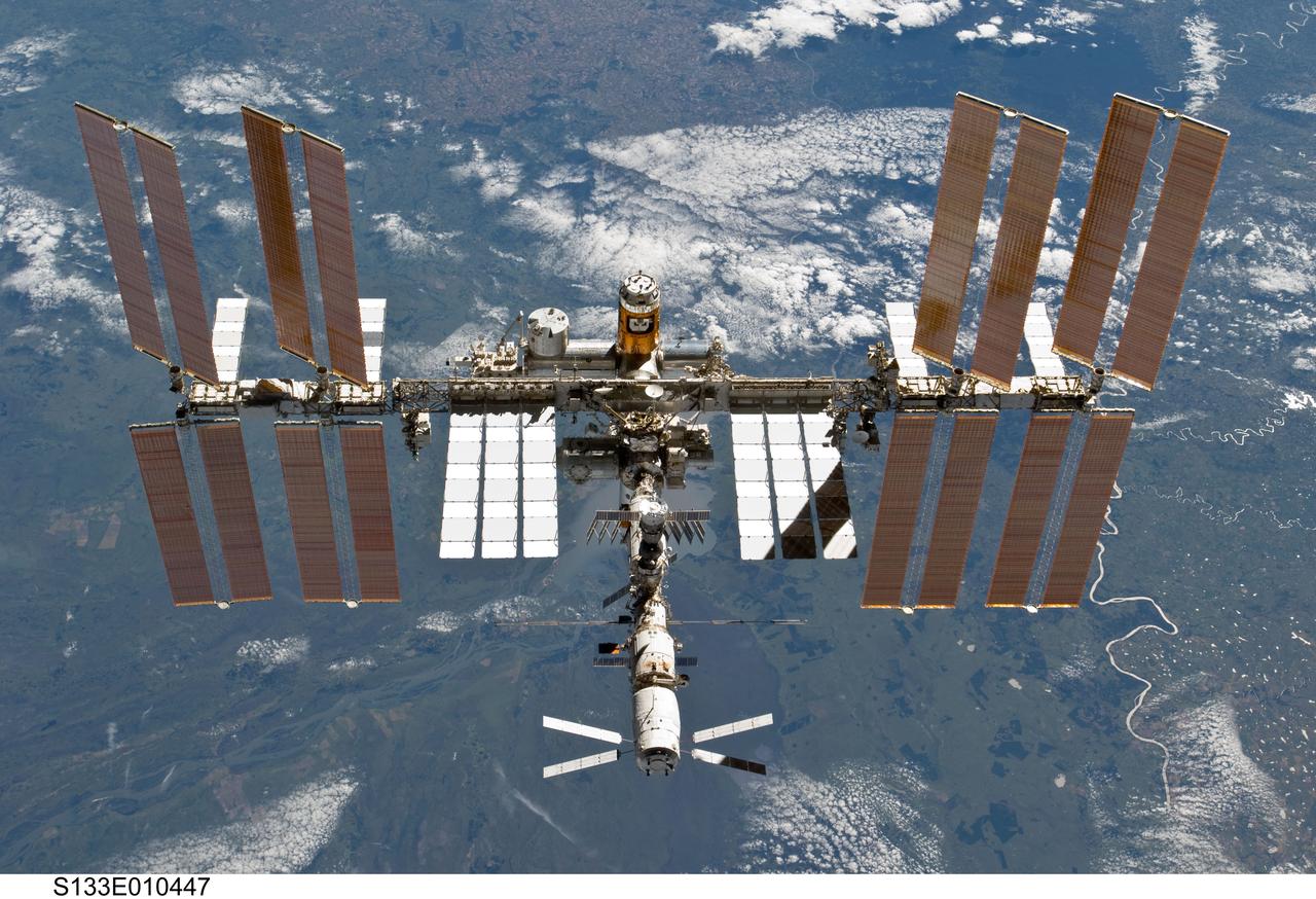 S133-E-010447 (7 March 2011) --- The International Space Station is featured in this image photographed by an STS-133 crew member on space shuttle Discovery after the station and shuttle began their post-undocking relative separation. Undocking of the two spacecraft occurred at 7 a.m. (EST) on March 7, 2011. Discovery spent eight days, 16 hours, and 46 minutes attached to the orbiting laboratory. Photo credit: NASA or National Aeronautics and Space Administration