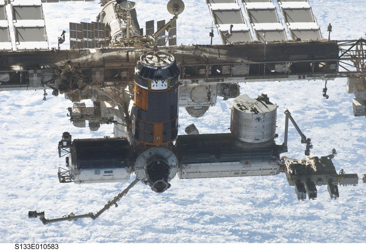 S133-E-010583 (7 March 2011) --- A close-up view of the International Space Station is featured in this image photographed by an STS-133 crew member on space shuttle Discovery after the station and shuttle began their post-undocking relative separation. Undocking of the two spacecraft occurred at 7 a.m. (EST) on March 7, 2011. Discovery spent eight days, 16 hours, and 46 minutes attached to the orbiting laboratory. Photo credit: NASA or National Aeronautics and Space Administration