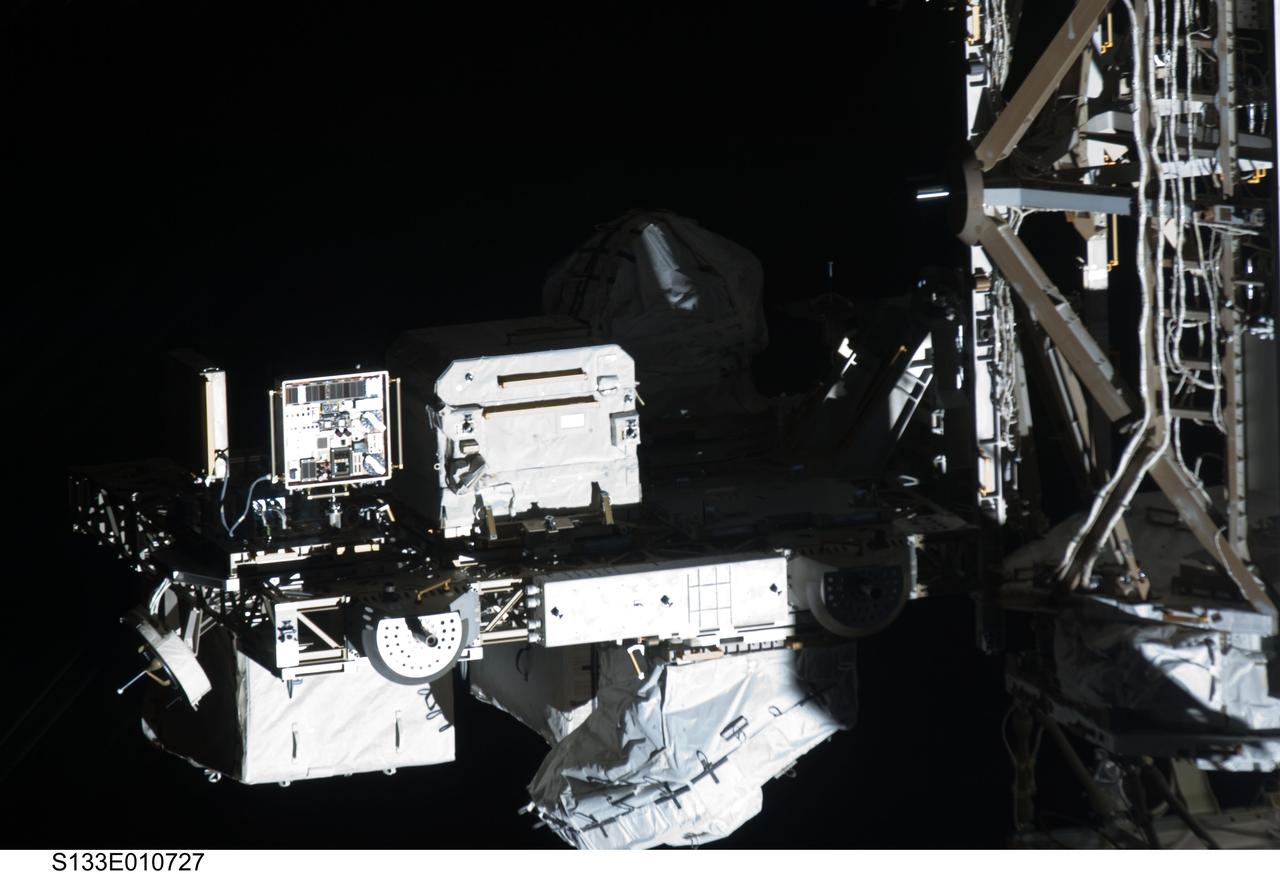 s133e010727 (3/7/2011) --- The Materials International Space Station Experiment-7 (MISSE-7) is a test bed for materials and coatings attached to the outside of the International Space Station being evaluated for the effects of atomic oxygen, ultraviolet, direct sunlight, radiation and extremes of heat and cold.